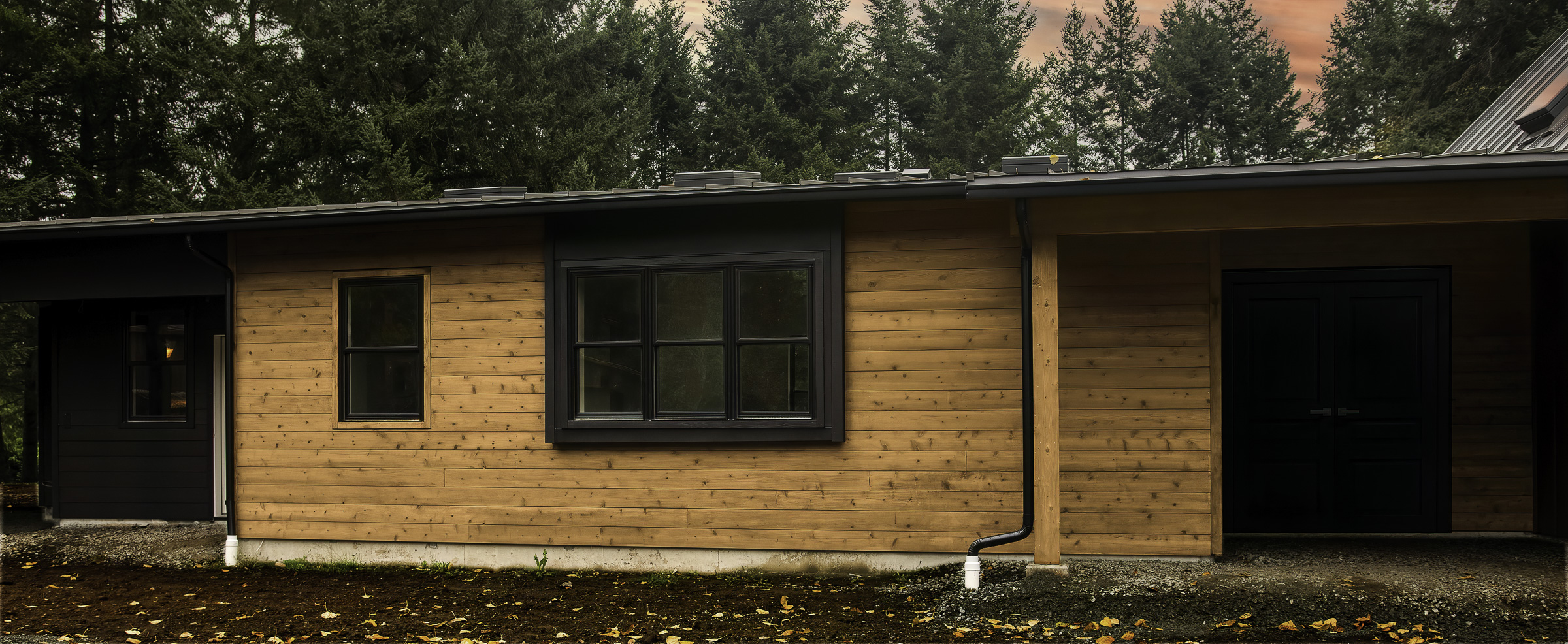 Clear stained siding project with clean exterior details by Breeze Siding