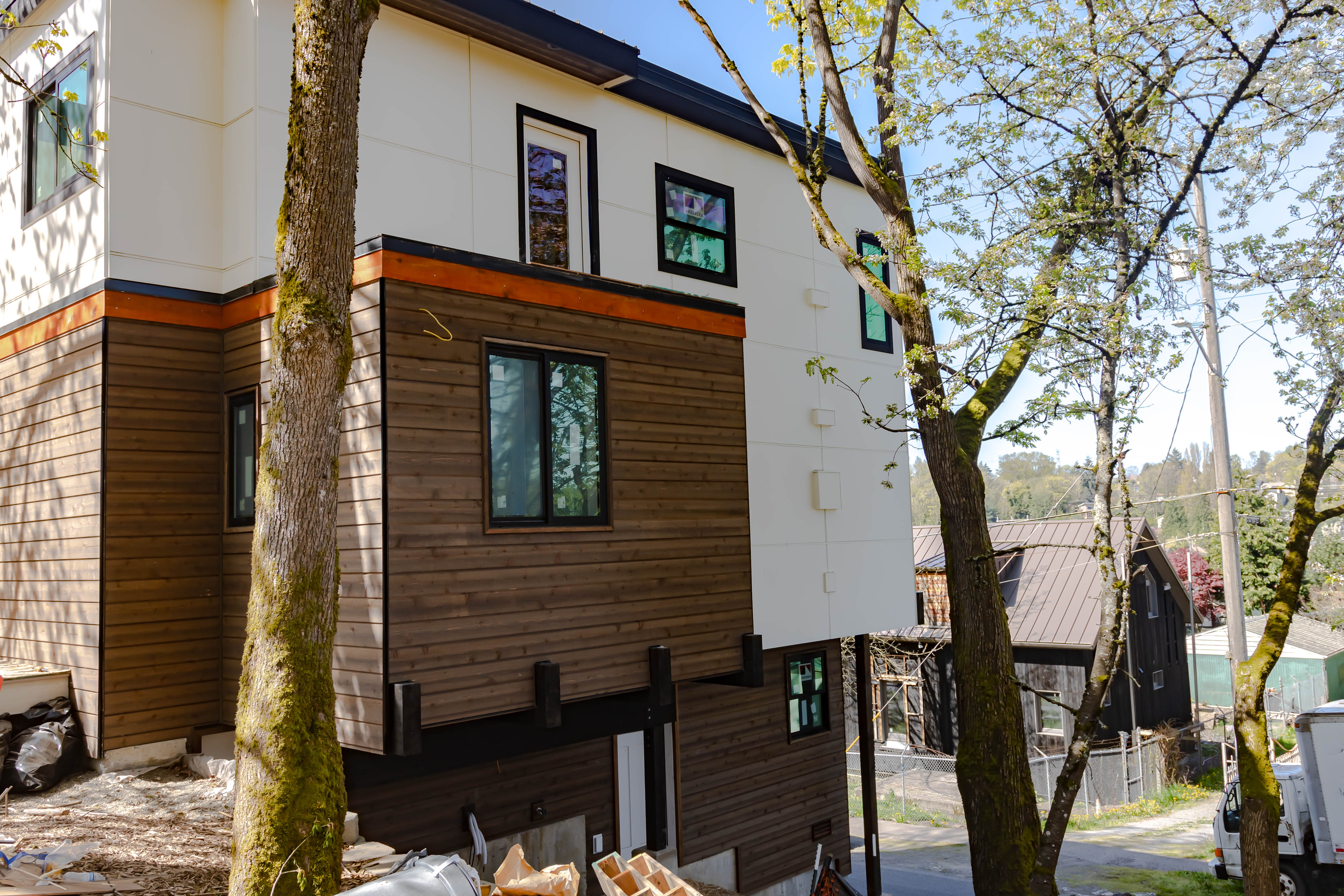 Outdoor exterior project with deck and siding elements