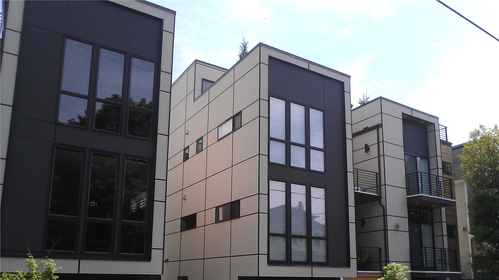 Hardie panel siding on a modern multi-family exterior