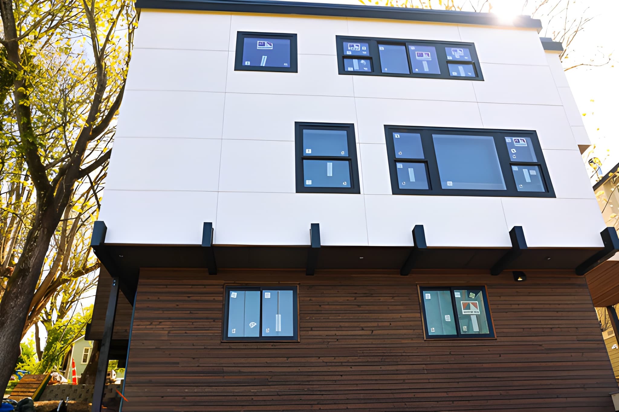 Finished siding exterior with crisp window and trim details